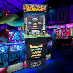 Barely used Arcade1Up Defender/Rampage arcade cabinet with riser. In excellent, like-new condition.