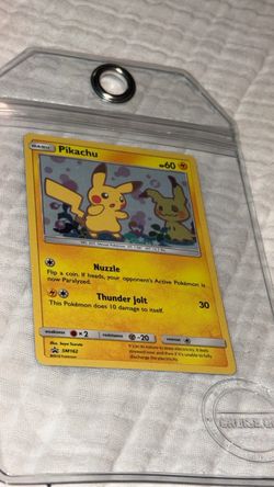 Nice card. That's the **Pikachu SM162 promo** — the 2019 Team Up blister promo with Mimikyu in the art (Saya Tsuruta). Raw ungraded, it's going for *