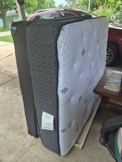 Nice Used Full Size Mattress and Box Spring only.
