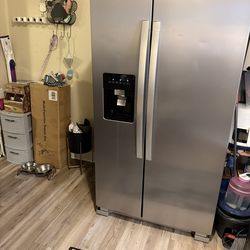 Silver Frenchdoor Whirlpool Refrigerator & Freezer