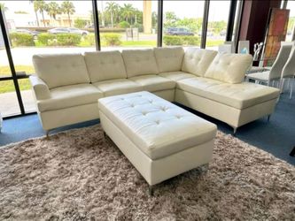 White sectional sofa with ottoman for sale! Ask for price.