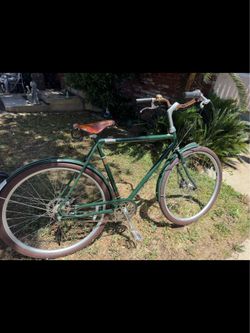 Raleigh Tourist classic city bike with a brown  leather saddle seat in great shape