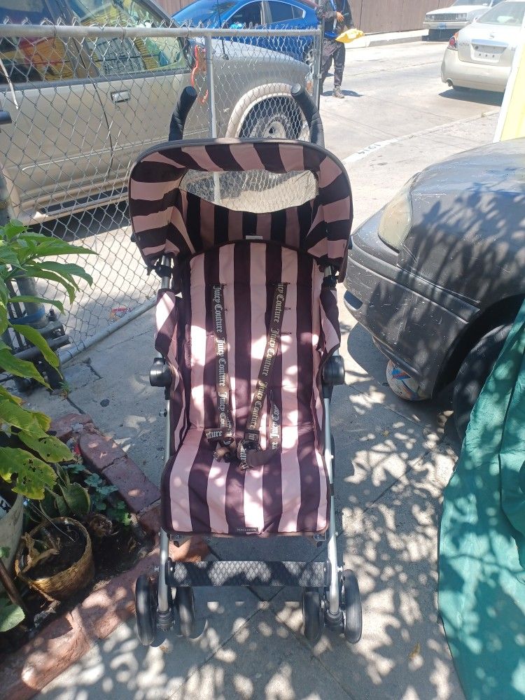 A toddler photo baby stroller not new but in good condition