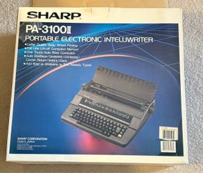 Sharp portable electric typewriter