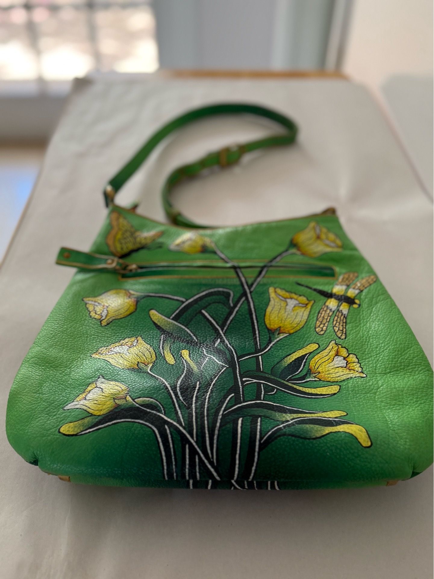 Flowered leather shoulder bag