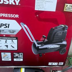 Husky 8 Gal. 150 PSI Portable Electric Oil-Free Horizontal Hotdog Air Compressor with Rubber Wheels and 1-Quick Coupler