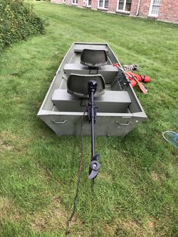 FOR SALE!!!: 12 foot flat bottom Jon boat with trolling motor, 2 seats,  oars, life jackets, cup holders, rod holder, and anchor. No trailer or  batter for Sale in Westford, MA - OfferUp