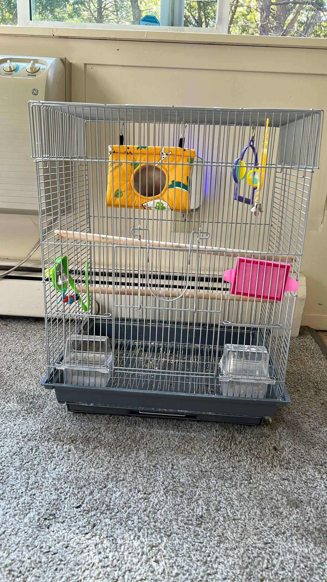 Parakeet Cage With Some Toys 