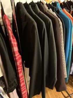 Tons Of Women and Men Clothing To Show On Here. Pants 26-34, Tops,Dresses XS-L