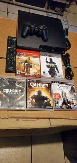 Playstation 3 Slim Complete With 5 Games & DVD Remote