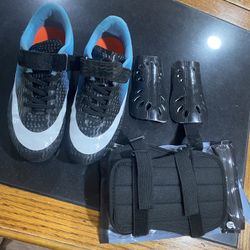 Boys Soccer cleats and 2 pairs of shin guard