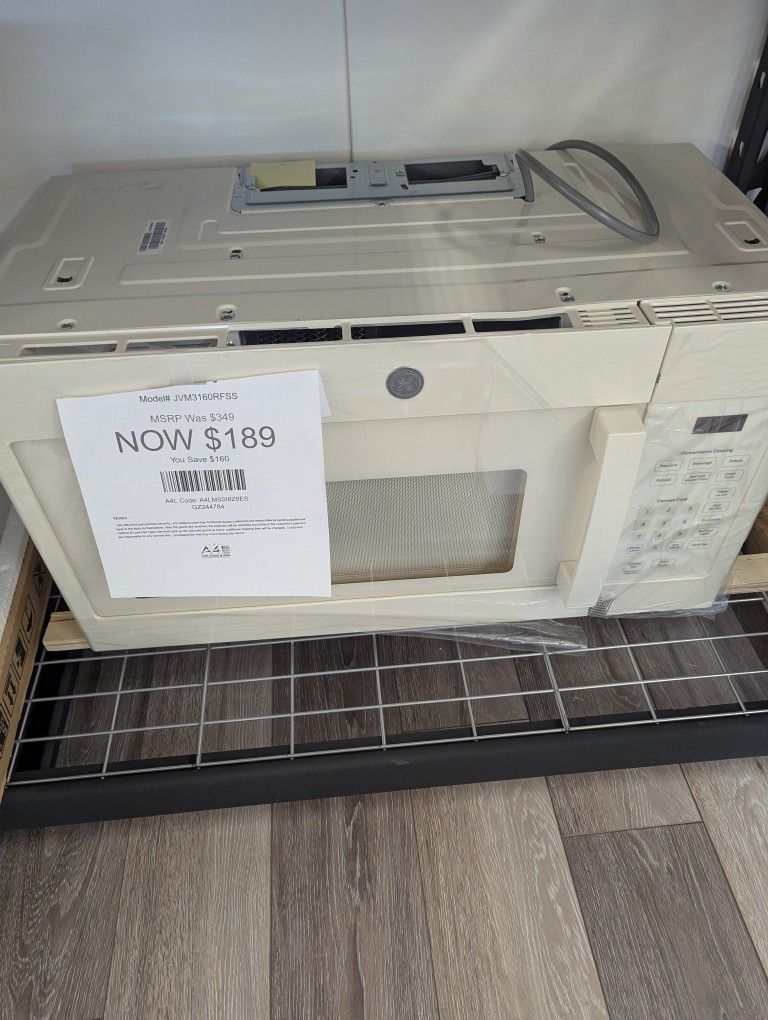 GE Over The Range Microwave In Beige