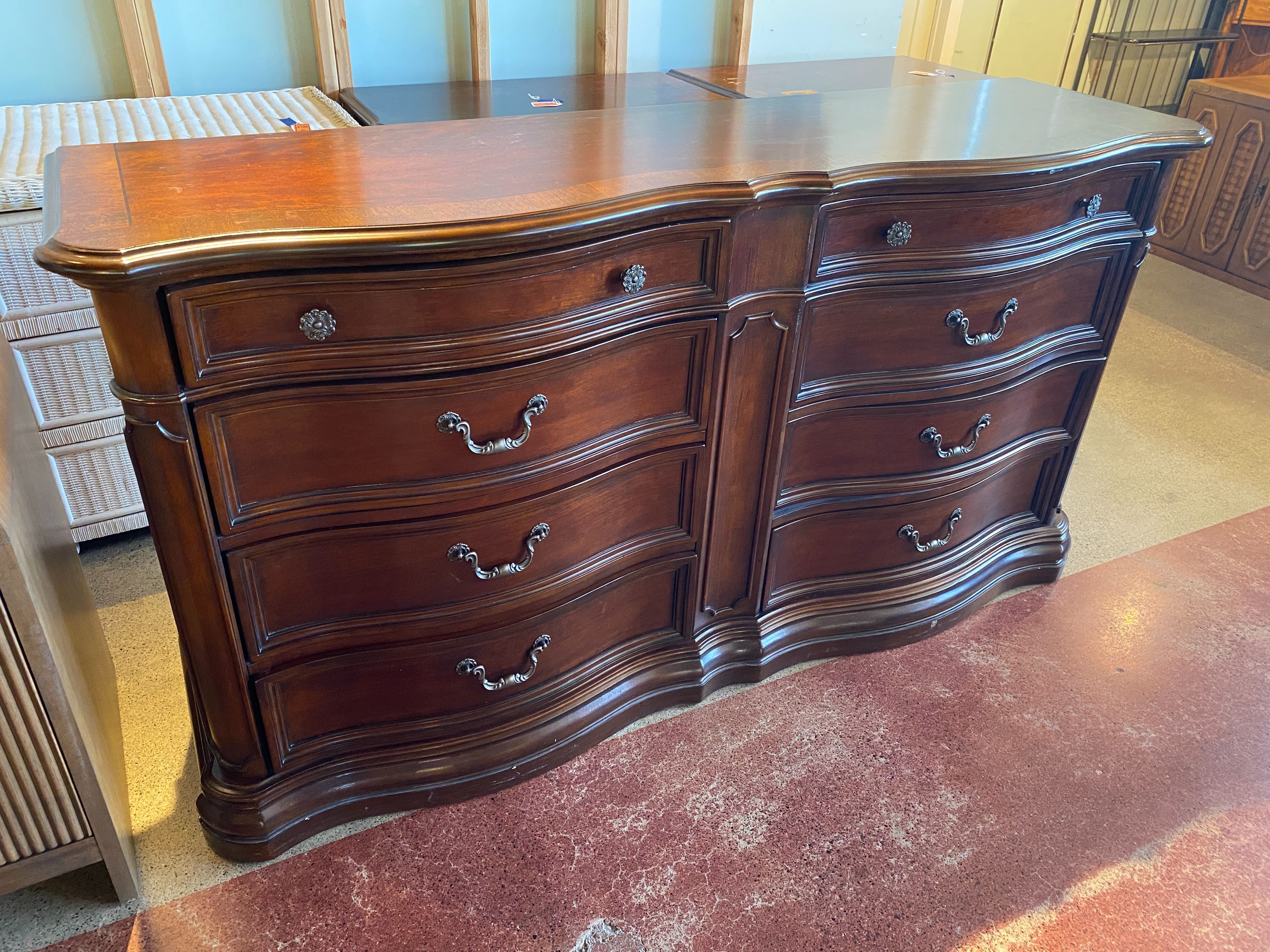 Ornate Bow-Front Dresser with a Cherry Stain