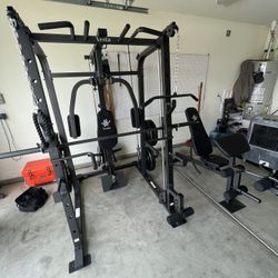 SMITH MACHINE/ PULLEY SYSTEM/ SQUAT RACK/ ADJUSTABLE BENCH/ BARBELL/ OLYMPIC BUMPER PLATES/ GYM EQUIPMENT/ FREE DELIVERY 🚚