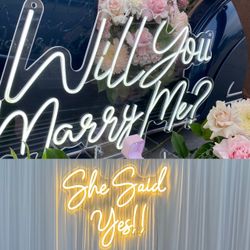 Two Engagement Neon Signs
