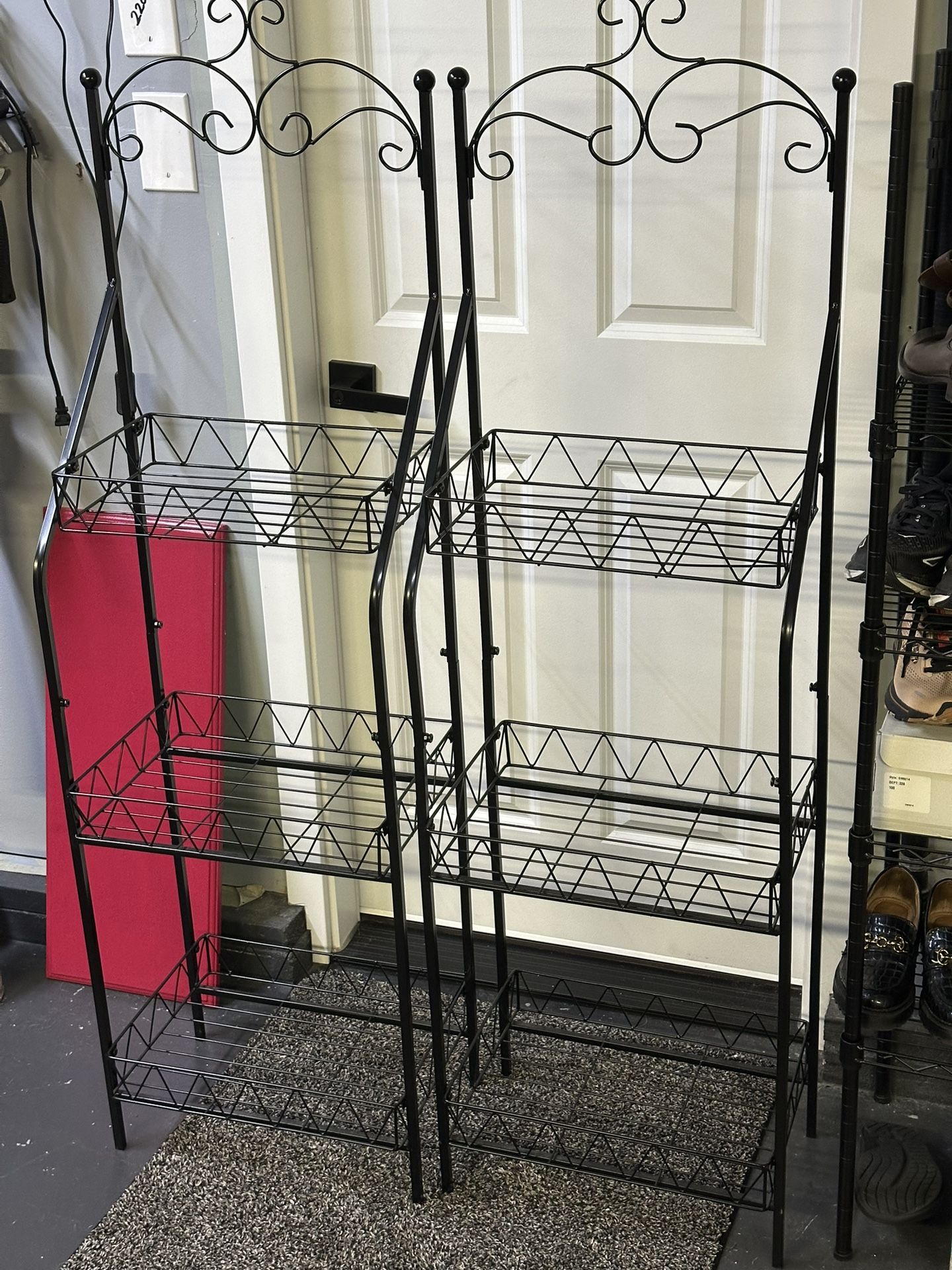 Two metal display racks