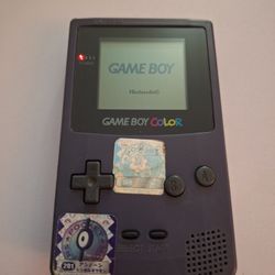Gameboy Color With Pokemon Stickers 