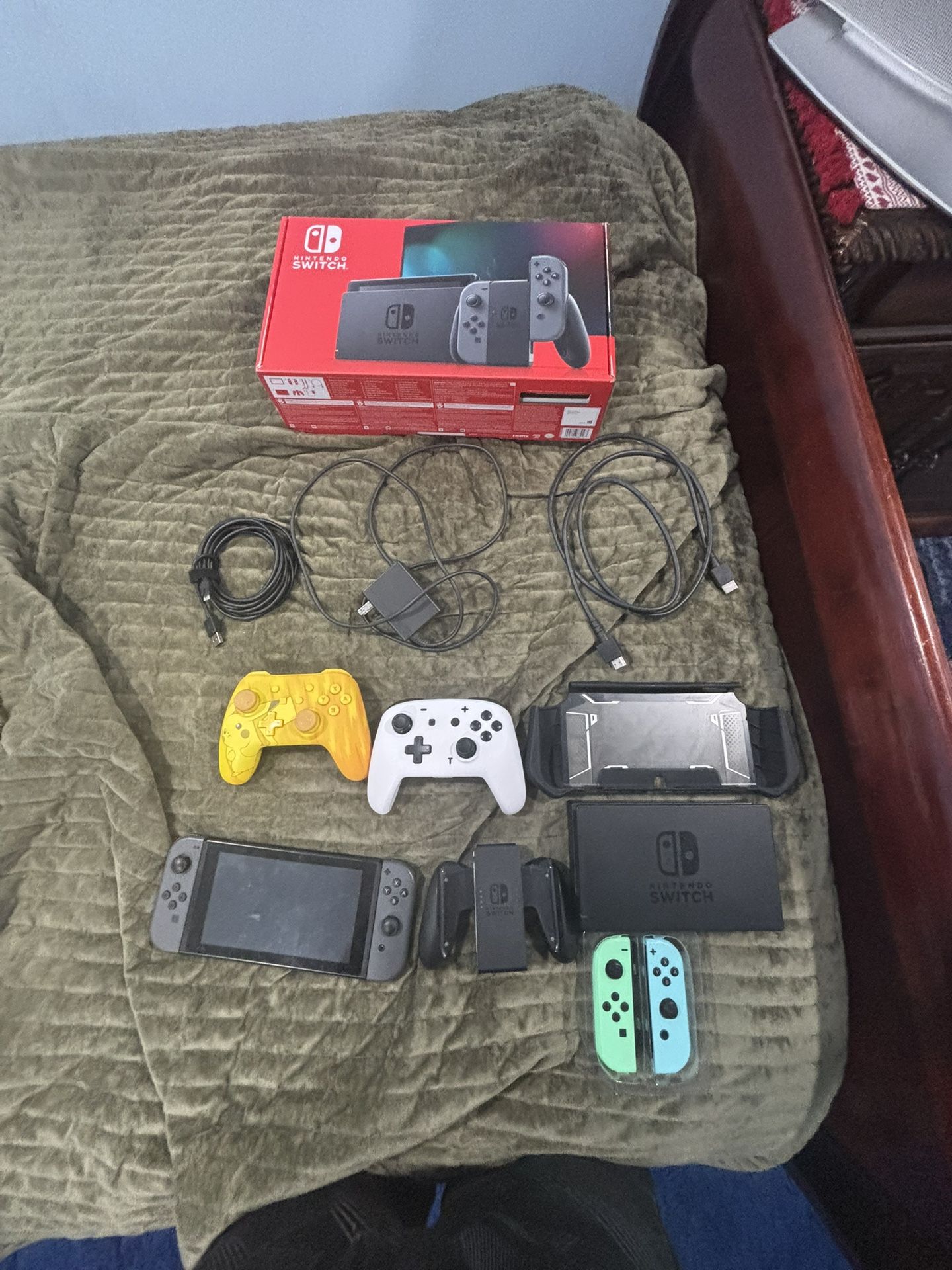nintendo switch with two controllers two new joysticks and a case
