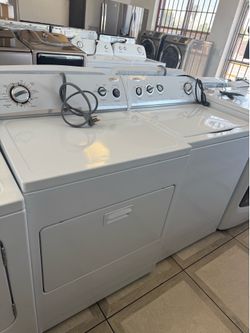 Whirlpool top load washer and electric dryer set