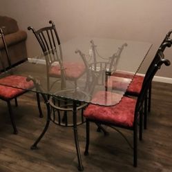 GLASS TOP DINING TABLE