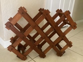 Handy n strong holder rack for 10 bottles (GoodWood brand)  Folding Accordion style. ($10.00) Great Deal!