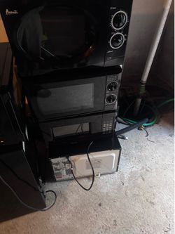 9 Microwaves and 1 mini Fridge