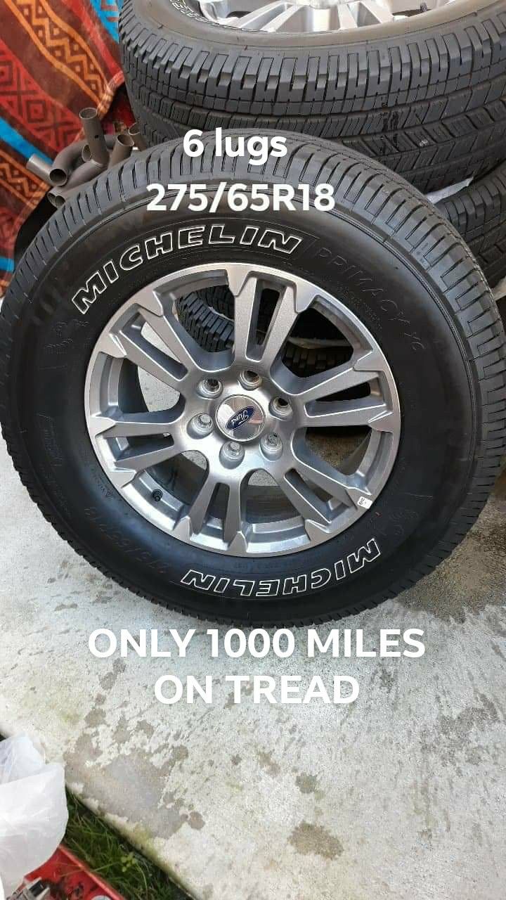 F-150 stock rims with tire.