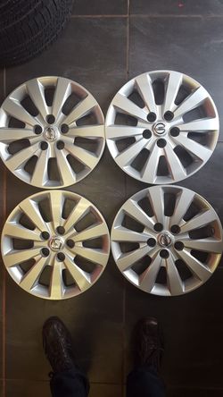 A SET OF NISSAN SENTRA 2013 2018 HUBCAPS GENUINE