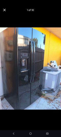 GE refrigerator 33 in wide 70 in high 31 in deep