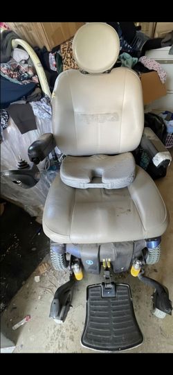 Electric Wheelchair/Silla de Ruedas Eléctrica