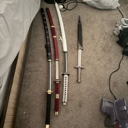 Dull katanas and mini midevil sword