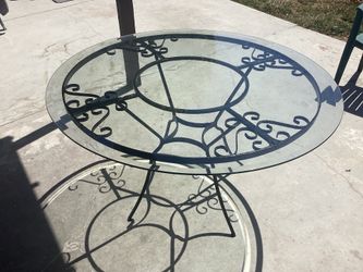 Vintage iron cast table with glass top