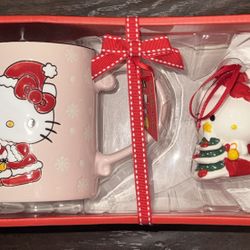Hello Kitty Christmas Mug & figurine $25