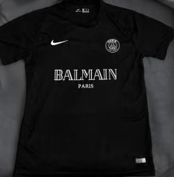 Nike PSG black jersey with white text reading 'BALMAIN PARIS'