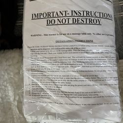 Massage Table. And HOT towel Cabby. Electric Heating Pad, Two Fleece table Covers, Two Sets Of Sheet Sheets. And Table size Blanket.