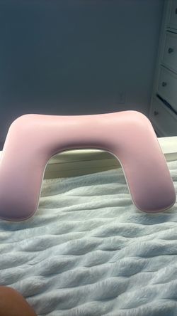 Pink hand rest for nails