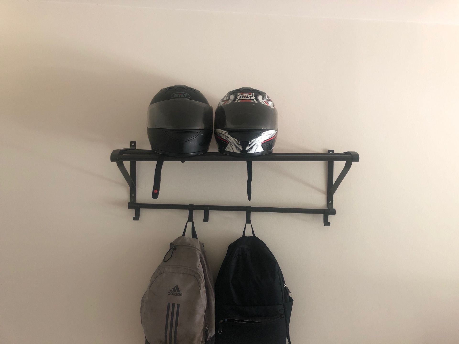 Two Small sizes helmets and the stander