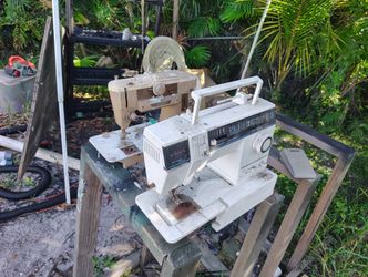 2 Singer Sewing Machines