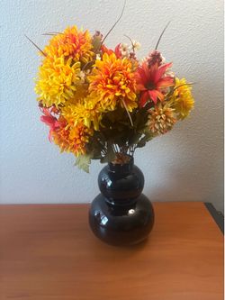 Vase and artificial flowers