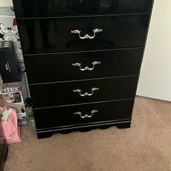 Ashley Black And Marble Tall Dresser