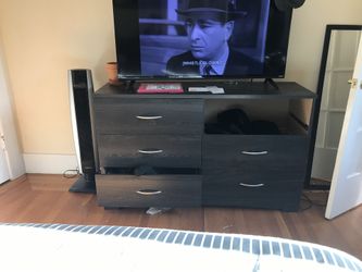 Dark grey dresser missing one drawer