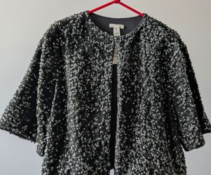 New Size M sequined Blouse, Open Front with 1 hook fastener, and jersey lining.