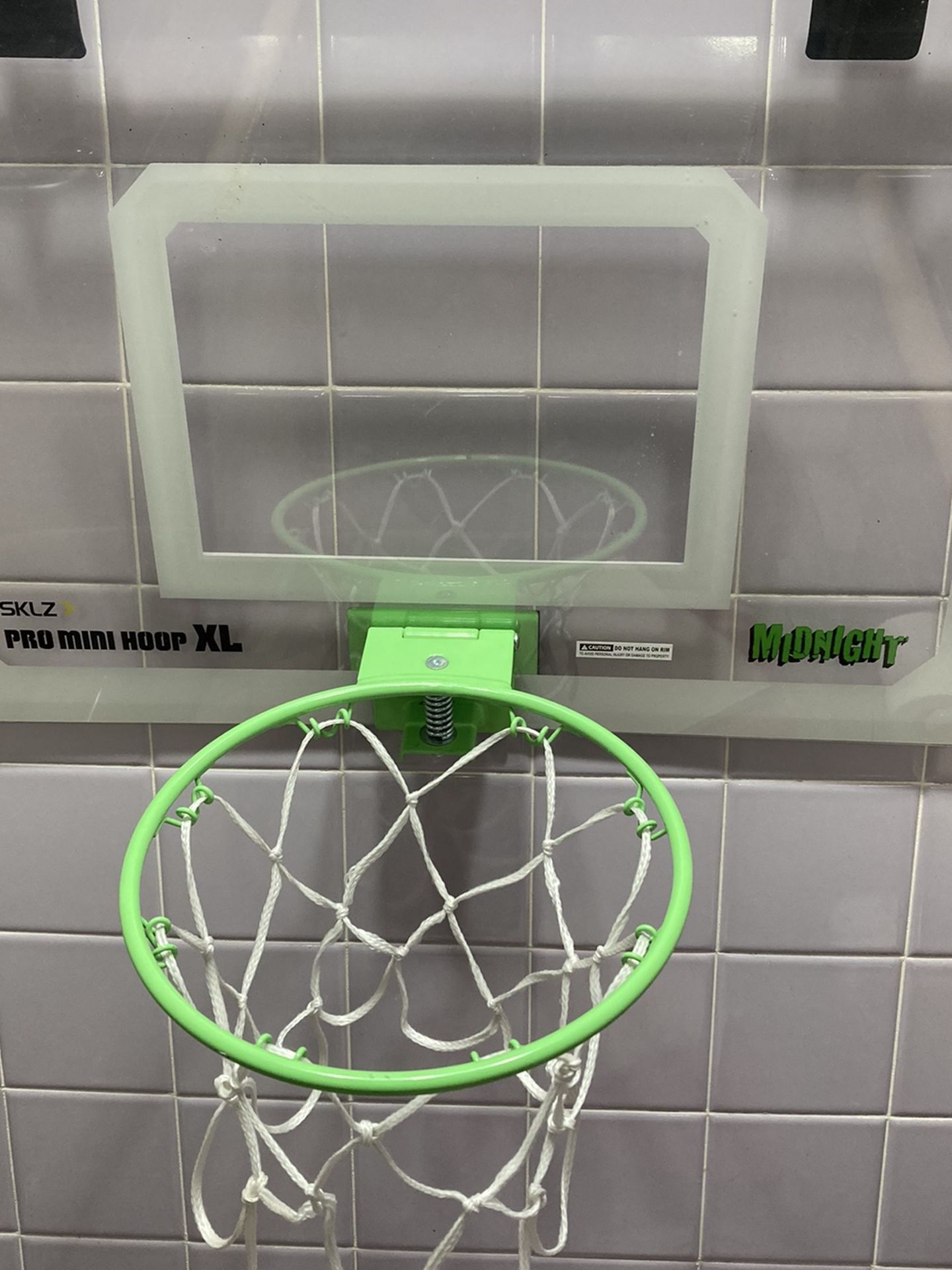 pro mini basketball hoop over door with shatterproof backboard.