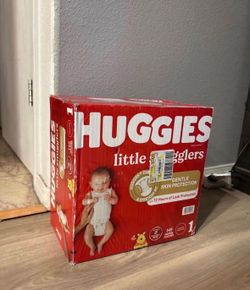 148 count of size one diapers un open box