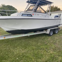Mako 23 feet with aluminum trailer