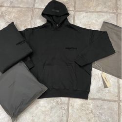 Essentials Hoodie Black Stretch Limo sizes below!