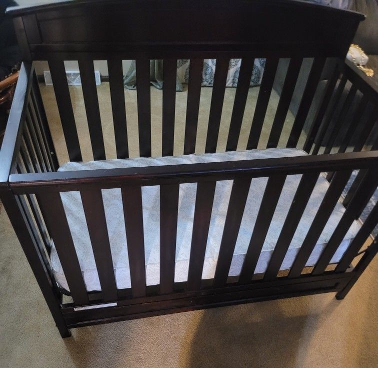 Baby Crib. Adjustable With Mattress 