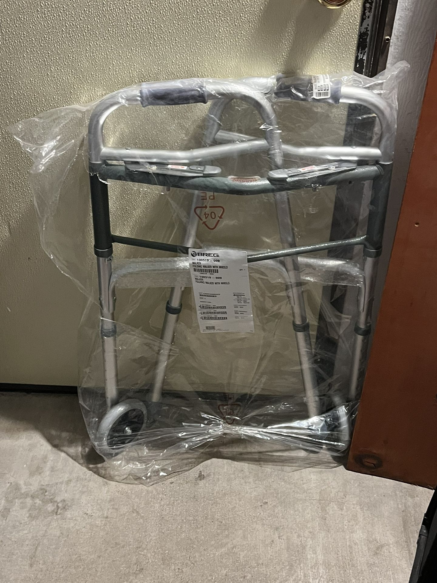 BRAND NEW... Highest Quality…Breg Folding Walker With Wheels