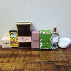 7 Mini Perfume Bottles $80 For 7