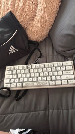 60% white keyboard used with USB wire plug in